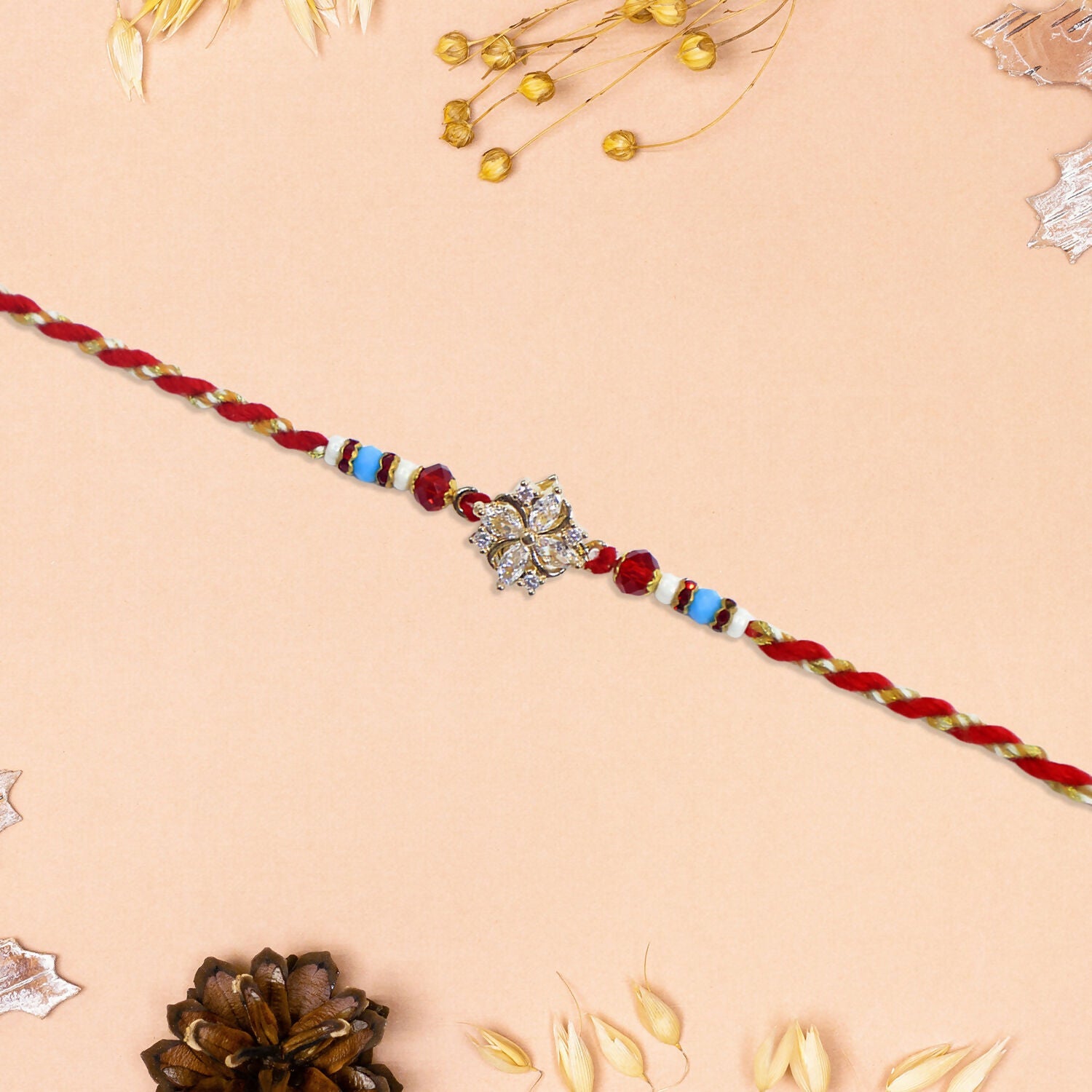 Graceful Floral Diamond Rakhi Set – Pack of 4 Rakhi  & Premium Gift Box