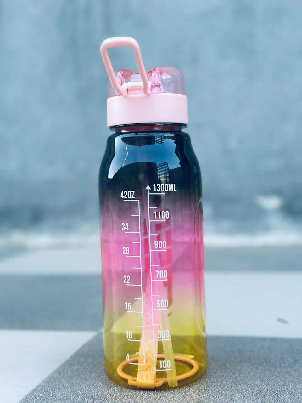 Motivational 1300 ML three shaded water bottle (BLACK AND YELLOW)