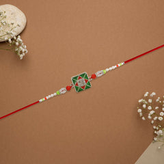 Combo Pack of 12 Green Square Designer Rakhis with Red Accents and Pearl Beaded Threads – Festive Gift Edition